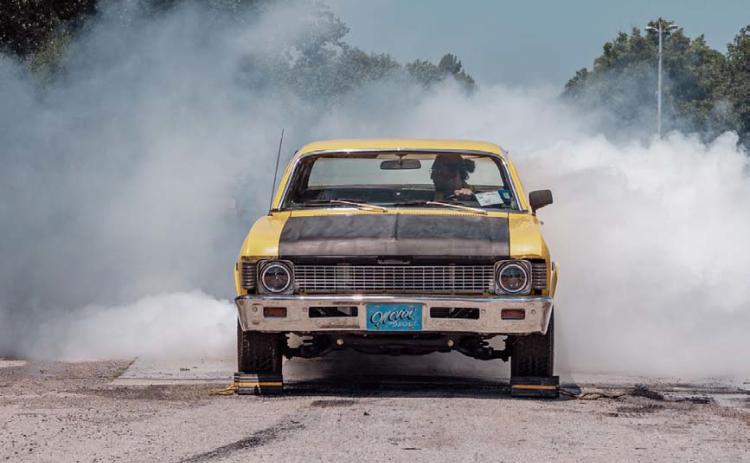 Smoke filled the air during the burnout competition as seven vehicles showed off for the crowd. ADAM BARRIOS | DISPATCH RECORD