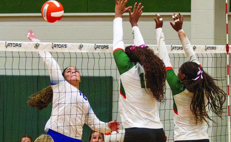 Outside hitter Adalynn “Lou” Munoz powers through Gateway’s blockers to earn a kill. ANA SOFIA MEYER | DISPATCH RECORD