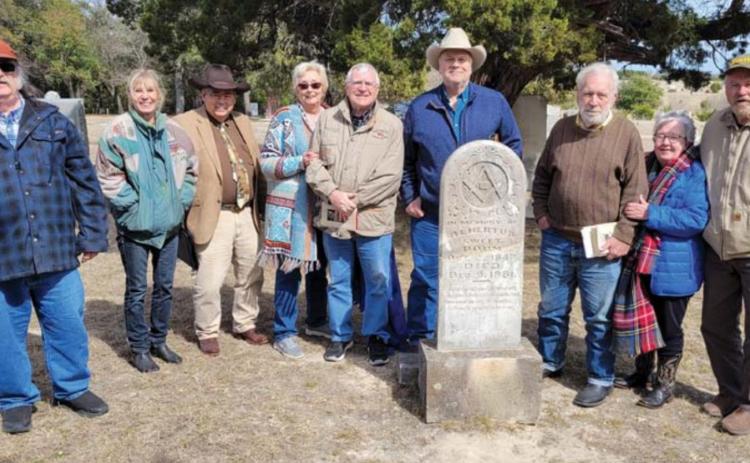 Refurbished tombstone rededicated