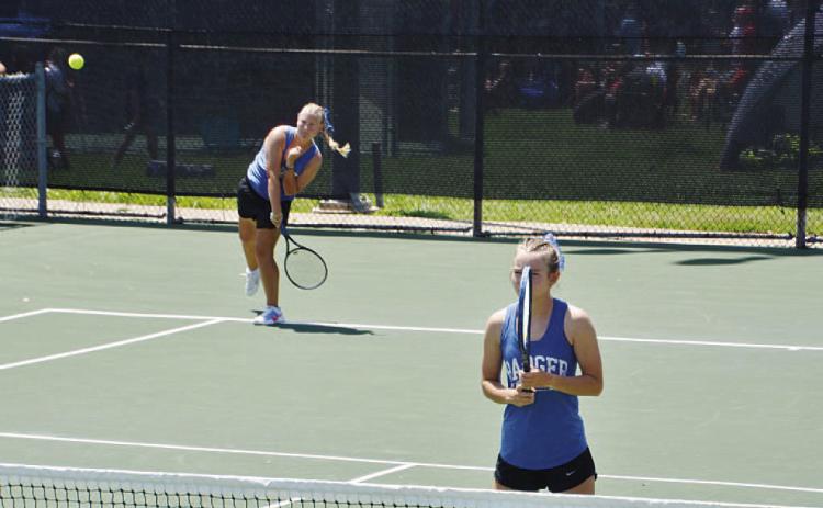 Sydney Unger (back) and Taylor Sheard compete at the regional tennis tournament last week. COURTESY PHOTO | KENNETH PEISER