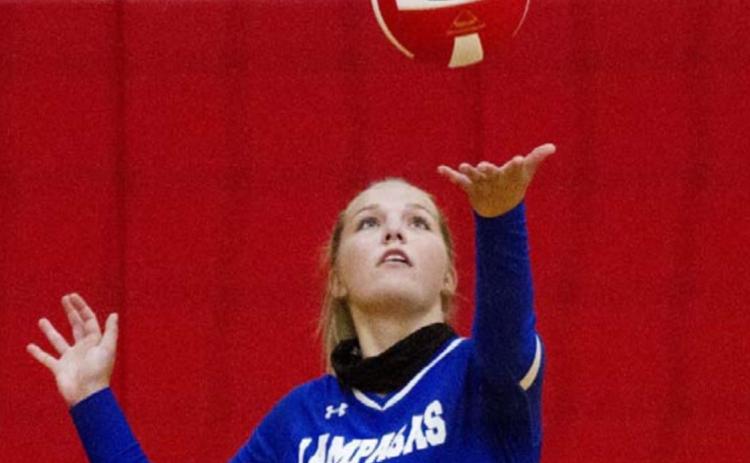 Laurcy Bender prepares to serve for the Lady Badgers during a game last year. FILE PHOTO