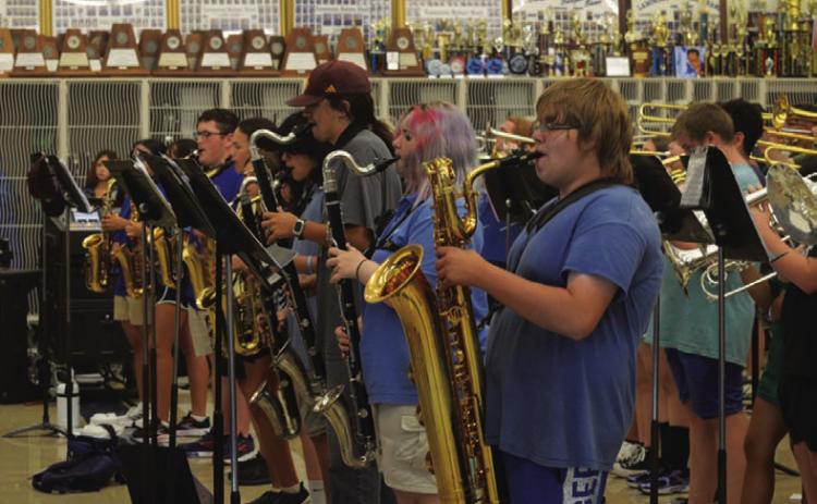 The Lampasas Badger Band practices songs from its upcoming 2026 marching show. The band has received over $200,000 in community donations to aquire new instruments and two band equipment trailers. ERICK MITCHELL | DISPATCH RECORD