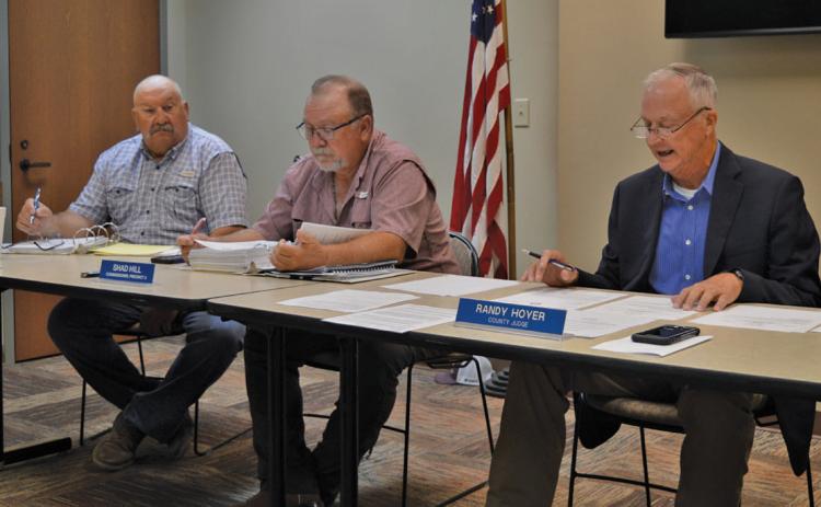 Lampasas County Commissioners Court convened in the conference room at the county annex on Monday, as rehabilitation work continues in the courthouse. Pictured are, from left, Commissioner Mark Rainwater, Commissioner Shad Hill and County Judge Randy Hoyer. erick Mitchell | dispatch record