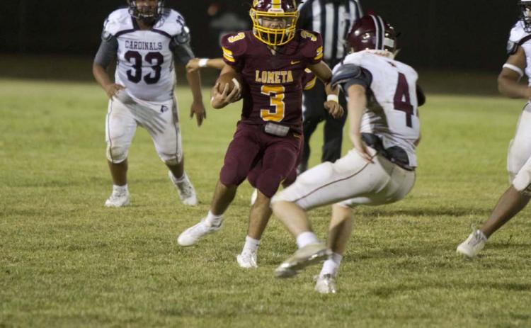 Alonso Caso tries to move past a Lingleville defender during the season-opener for the Hornets last Thursday. HUNTER KING | DISPATCH RECORD
