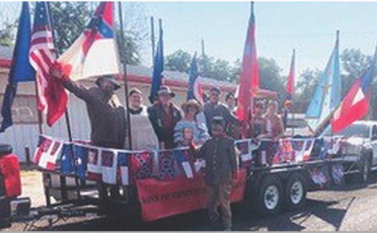 The Sons of Confederate Veterans participated in the DeLeon Peach and Melon Festival &amp; Parade, where members handed out candy and shared their Southern heritage with the crowd. The SCV float also took third place in the parade. courtesy photo