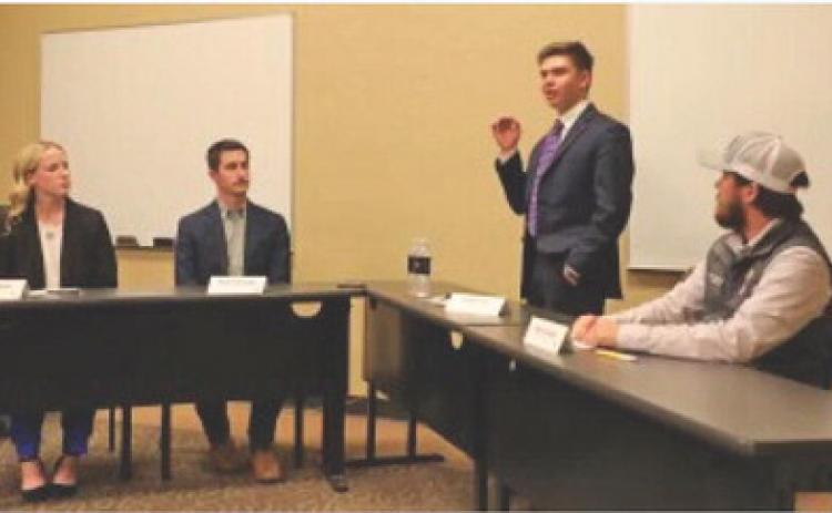 Dawson Raub, a member of the Lampasas County Farm Bureau, makes his final points at a Texas Farm Bureau Collegiate Ag Discussion competition heat held recently in Waco. courtesy photo
