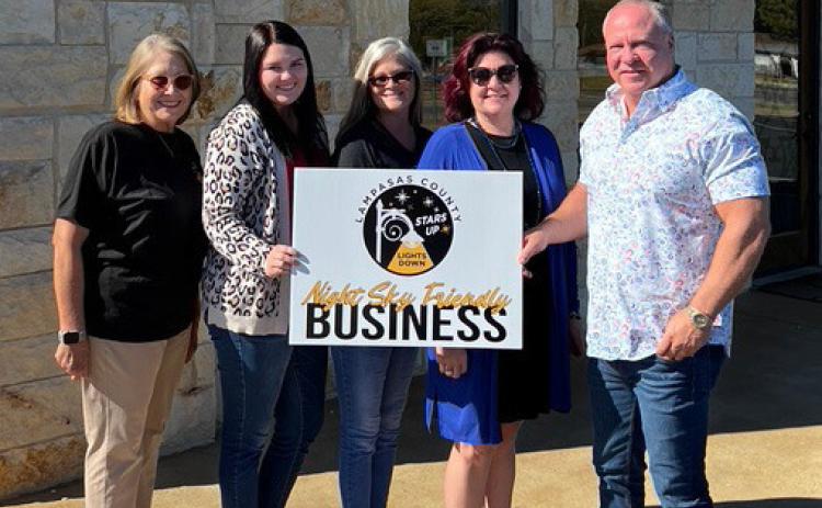 Lampasas County Friends of the Night Sky business liaison Martha Noell, at left, is pictured with Harrell &amp; Associates team members, left to right, Bailey Oldham, Evette Bowen, Jamie Garrett and owner Jack Harrell, whose firm received the Night Sky Business Award. courtesy photo