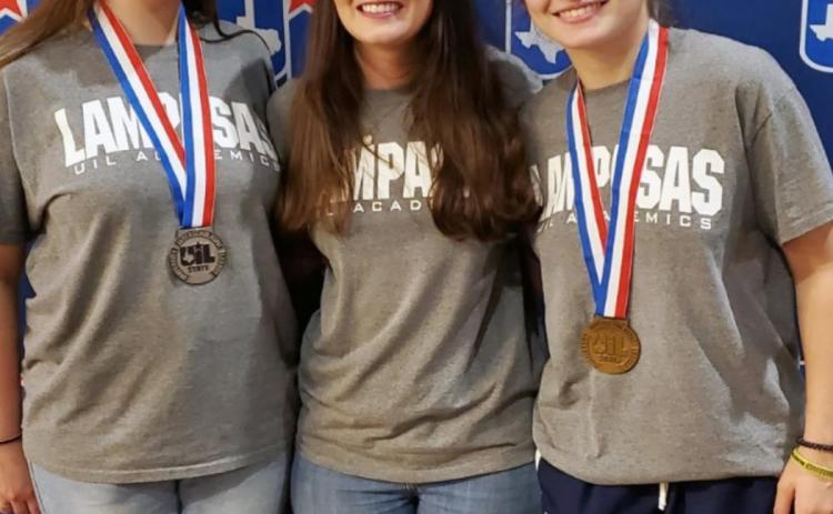 Lydia Breuer, left, and Amelia Stanley, at right, stand with the LHS newspaper adviser and UIL coach Kayla Cain after placing at the state meet. VERONICA BUTLER | DISPATCH RECORD