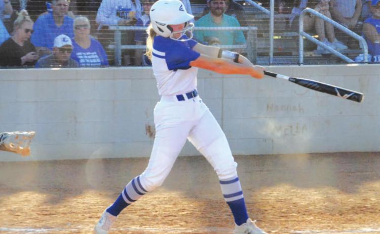Kamryn Kothmann swings at a pitch during the Lady Badgers’ game last week against Brownwood. HUNTER KING | DISPATCH RECORD