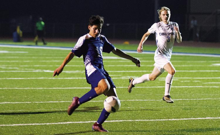 HUNTER KING | DISPATCH RECORD Edwin Alvarado Gomez takes a shot on goal during the second half of Tuesday’s match against China Spring.