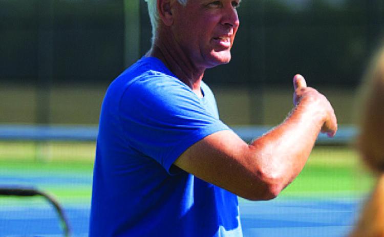 Kenneth Peiser talks with tennis players during 2023. FILE PHOTO