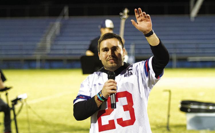 FILE PHOTO FCA coordinator Jaden Napolez speaks during last year’s Fields of Faith event.