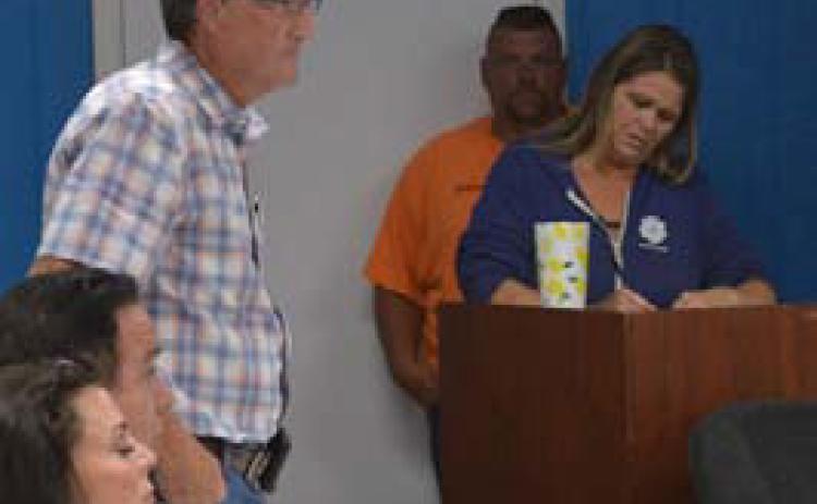 KWSC General Manager Bruce Sorenson addresses water customers who gathered at last week’s board meeting. ERICK MITCHELL | DISPATCH RECORD