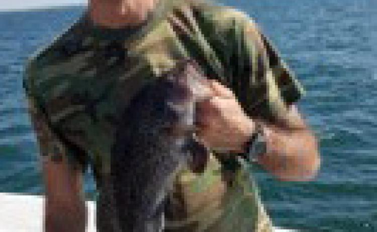 Mark Nicolas enjoys a fishing session before beginning residential treatment in Texas. COURTESY PHOTO