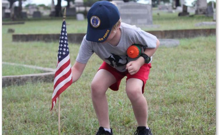 Residents honor military service members’ sacrifices