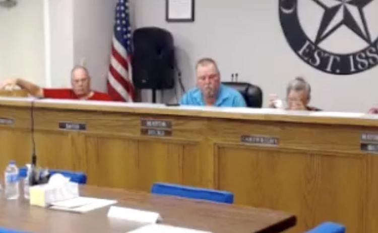 From left are City Attorney Arthur Bryan, Lometa council member Johnny Towerton, Mayor Stephen Hicks, council members Roni Cartwright, Bob Butler and James Dickison ss they discuss a water rate increase during Monday’s called meeting. CITY OF LOMETA ZOOM MEETING SCREENSHOT