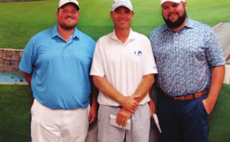 Logan Fox, left, Justin Schulze and Stayton Lindeman pose for a photo after finishing on the podium in the tournament. COURTESY PHOTO