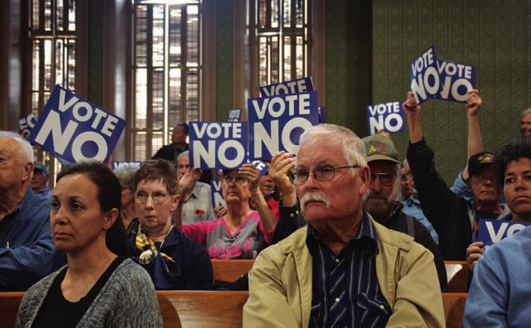 FILE PHOTO The Lampasas County Courthouse was packed for a public hearing in March about a proposal to designate acreage as a reinvestment zone so a solar farm project could qualify for tax abatements. The reinvestment zone was scrapped after a vote by the Commissioners Court. In May, the Lampasas Independent School District Board of Trustees voted down a similar tax incentive plan for the Green Go solar farm after significant opposition from area residents.