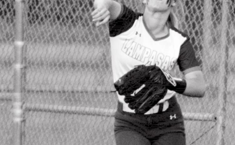 Bre Quarles makes a throw from right field