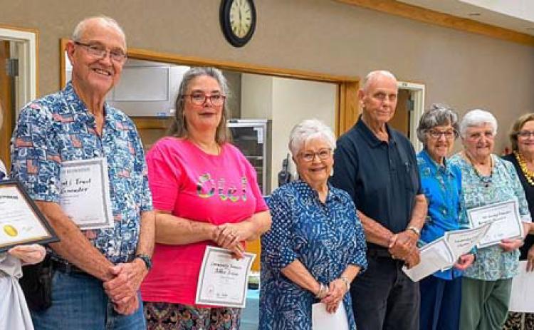 Lampasas County Retired Teachers Association held its last meeting of the school year May 5. Members received certificates of appreciation for their committee and advocacy work throughout the year. Pictured are, from left, Julia Phillips, Trent Lancaster, Debbie Irvine, Sandy Brister, TP Wingo, Charlene Ruzicka, Margaret Oberender, Jani Edwards and Janet Machen. COURTESY PHOTO