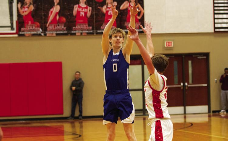 Peyton Sisson shoots over an outstretched hand for one of his three-point shots against Salado. HUNTER KING | DISPATCH RECORD