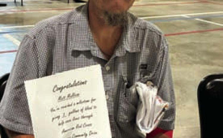 Matt Mullican marked the twogallon milestone on July 14 with his blood donation. COURTESY PHOTO