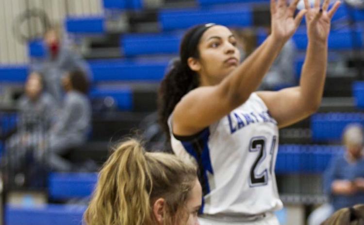 Rachel Myles shoots a free throw in the Lady Badgers’ 47-30 home victory over Lake Belton last week. JEFF LOWE | DISPATCH RECORD
