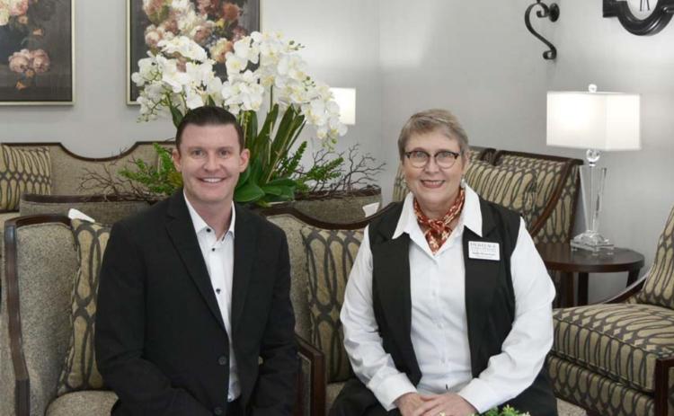 Heritage Funeral Homes co-owner Dr. James Mercer and Funeral Director Sally Bozeman are in the sitting room of the newly renovated funeral home. Mercer and Bozeman first worked together to provide funeral services in the late 1990s. MADELEINE MILLER | DISPATCH RECORD
