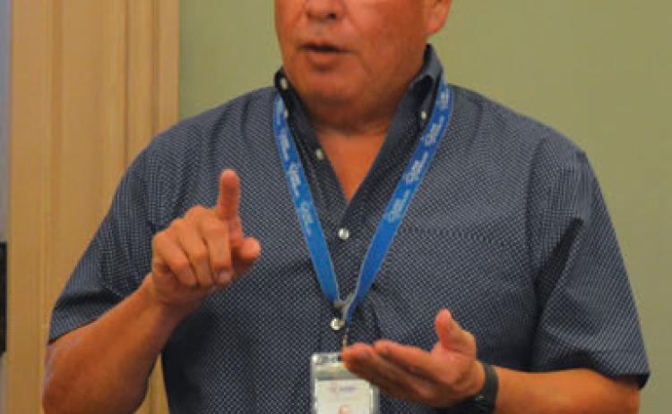 Central Texas Rural Transit District General Manager J.R. Salazar speaks to the Commissioners Court Monday to explain the services offered by the CARR bus system. erick mitchell | dispatch record