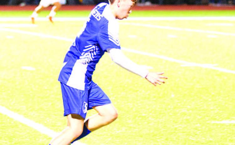 HUNTER KING | DISPATCH RECORD Kent Ashley dribbles through the midfield during last Friday’s match against Stephenville.