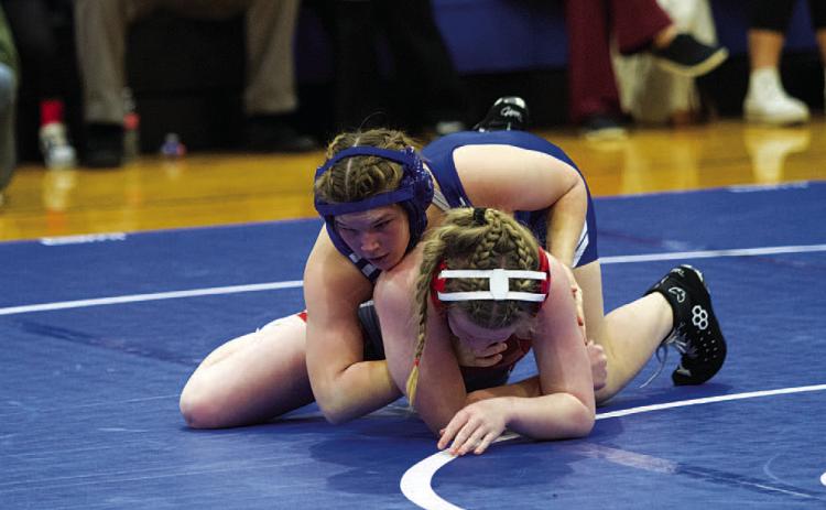 Taylor Martell and her team are wrestling at the THSWCA State Duals. The district wrestling meet will be held Jan. 29 at Burleson High School. HUNTER KING | DISPATCH RECORD