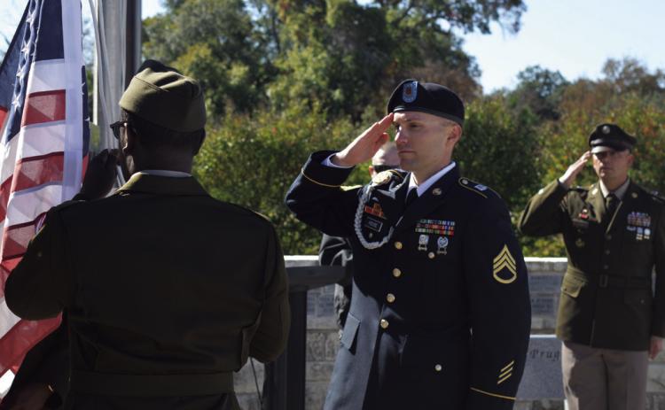 Members of the 62nd Engineer Brigade post the colors at Tuesday’s Veterans Day program, hosted at the Sylvia Tucker Memorial Park in Kempner. For more photos from various events recognizing veterans of the U.S. armed forces, see page 3. ERICK MITCHELL | DISPATCH RECORD
