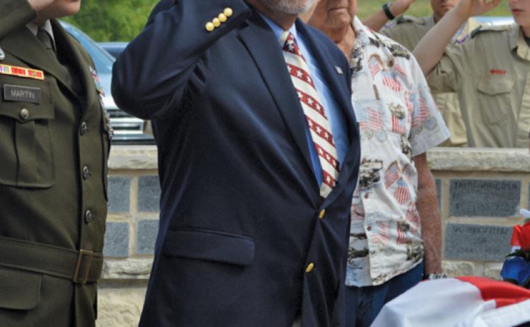 Gene Isenhour salutes during Kempner’s recent Memorial Day observance in honor of those servicemembers who died in the line of duty. erick mitchell | dispatch record