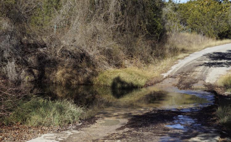 This low-water crossing is in need of repairs along County Road 2207 at Lucy Creek and will be funded by FEMA. ERICK MITCHELL | DISPATCH RECORD