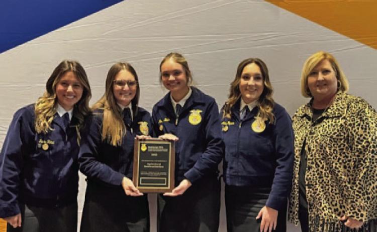 Congratulations are extended to the Lampasas FFA Agricultural Communications team that placed seventh in the national contest and ranked as a “gold team.” The award was presented last week at the National FFA Convention in Indianapolis. Team members are, from left, Jacie Resa, Paige Rutland, Morgan Littlefield Bobo and Avery Hopson, joined by FFA adviser and team coach, Judy Hail. COURTESY PHOTO