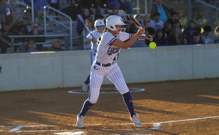 Madison Magilke lays down a bunt during an early-season game against Killeen Ellison. HUNTER KING | DISPATCH RECORD