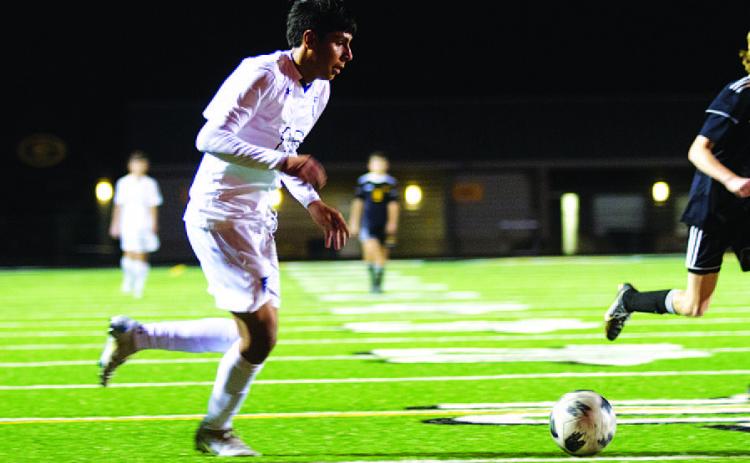 Jose Gomez dribbles in the box before getting a shot away against the Gatesville Hornets. HUNTER KING | DISPATCH RECORD
