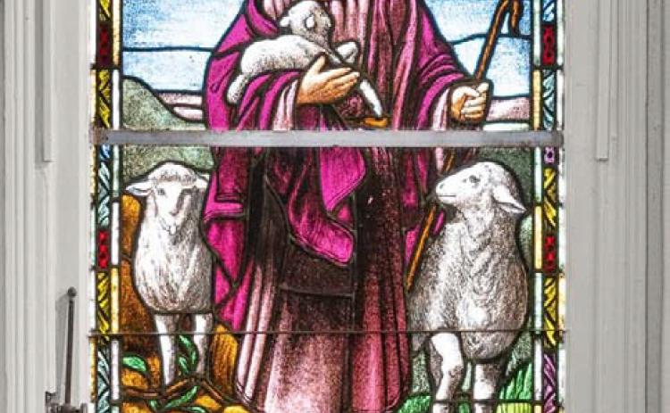 This stained-glass depiction of Jesus as the Good Shepherd is one of the windows project manager Olivier Fournier and his crew restored at St. Mary’s Episcopal Church. More photos are inside on page 3. COURTESY PHOTO