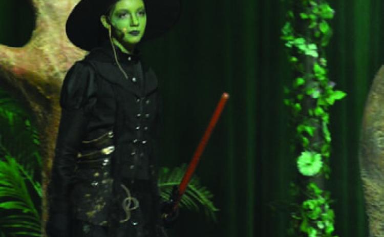 Maylee Harbin stars as the Wicked Witch in LHS’s rendition of “The Wizard of Oz.” ERICK MITCHELL | DISPATCH RECORD