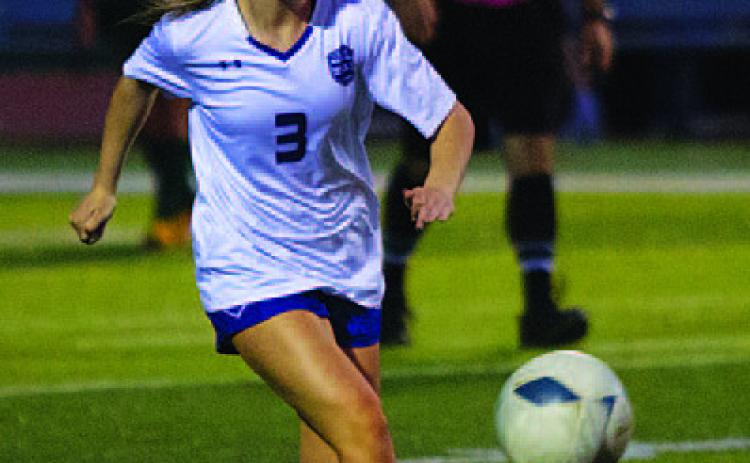 Aubrey Stubbs saw action in the midfield in last Friday’s match against Academy. HUNTER KING | DISPATCH RECORD