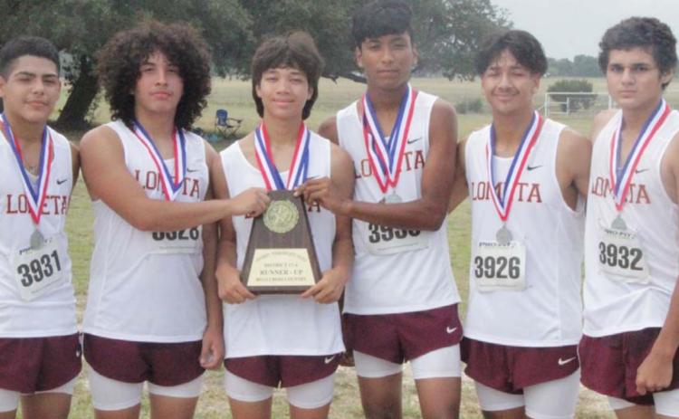 JESSICA MALDONADO | DISPATCH RECORD The Lometa boys’ cross country team poses with a trophy and medals after finishing second at the district cross country meet in Lometa.