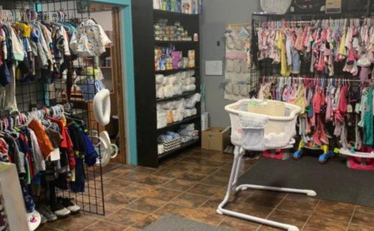 New Beginning of Restoration and Hope distributes children’s clothing and supplies to support new families. COURTESY PHOTO
