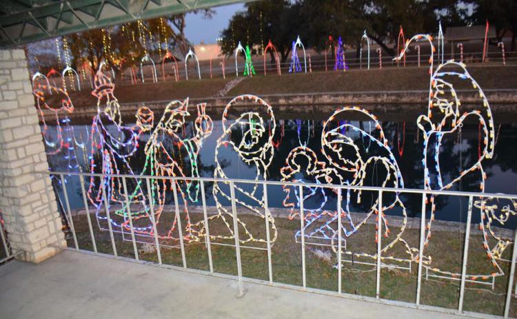 DISPATCH RECORD The special lighting displays in W.M. Brook Park are awaiting visitors. This nativity scene offers a reminder of the meaning behind the season, and the festive Candy Cane Lane can be seen across the creek. Plenty of family fun and additional holiday displays will be available Dec. 14 at the Christmas on the Creek celebration.