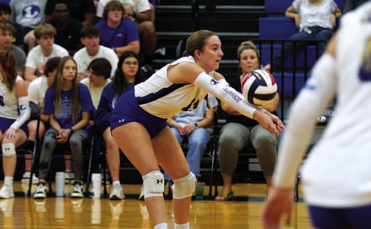 HUNTER KING | DISPATCH RECORD Abbey Green passes the ball to a teammate during the Lady Badgers’ match against Shoemaker.