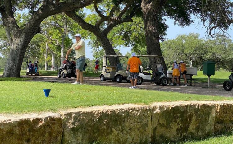 Golfers wait to tee off during last weekend’s Britches and Bows tournament at Hancock Park Golf Course. COURTESY PHOTO