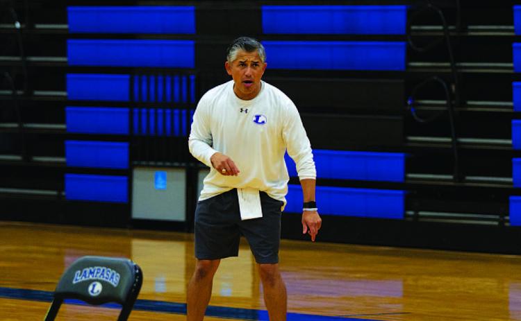 HUNTER KING | DISPATCH RECORD Marcus Chapa coaches his team at practice early in the 2024-2025 season.