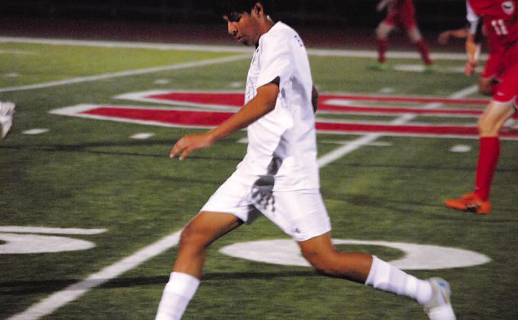 Jose Gomez prepares to play