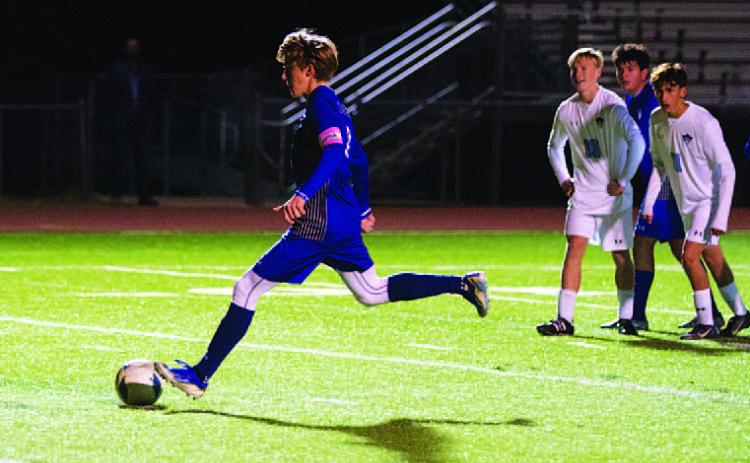 Parker Boykin scored this penalty kick for the Badgers. HUNTER KING | DISPATCH RECORD