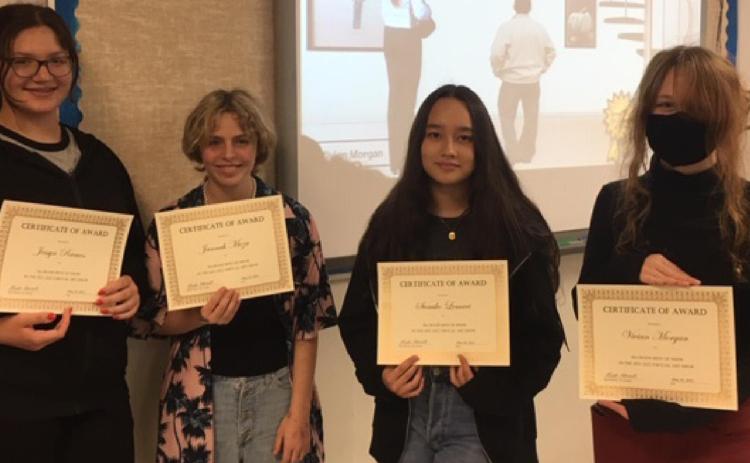 Named overall winners of the middle school virtual art show were, from left, seventh-graders Jessyn Ramos and Jannah Meza, and eighth-graders Sumiko Lemari and Vivian Morgan. courtesy photo