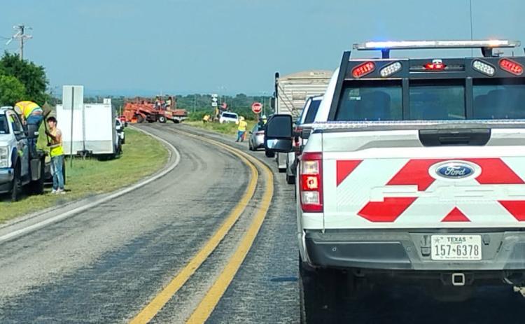 The Texas Department of Transportation commenced its summer sealcoat work in Lampasas last week. Here, TxDOT is working on FM 580 West to lay down a liquid asphalt layer on the roadway. The coating seals cracks, increases traction and helps prolong the life of the highway surface. Several other roadways in the county are scheduled for the sealcoating work. courtesy photo